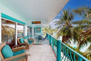 Terrace/patio - Waterfront Home with 35-Foot Dock, Bay Views, WiFi, and Shared Pool and Beach (Key Colony Beach)