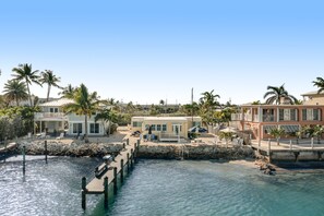 Exterior - Waterfront beauty with a dock, small private beach, washer/dryer, & gas grill (Key Colony Beach)