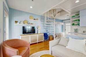 TV - Charming island retreat with balcony, king bed, desk space & dog-friendly vibe (Key West)