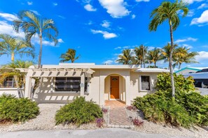 Exterior - Custom canal-front home with private pool, palapa hut, & outdoor kitchen (Marathon)