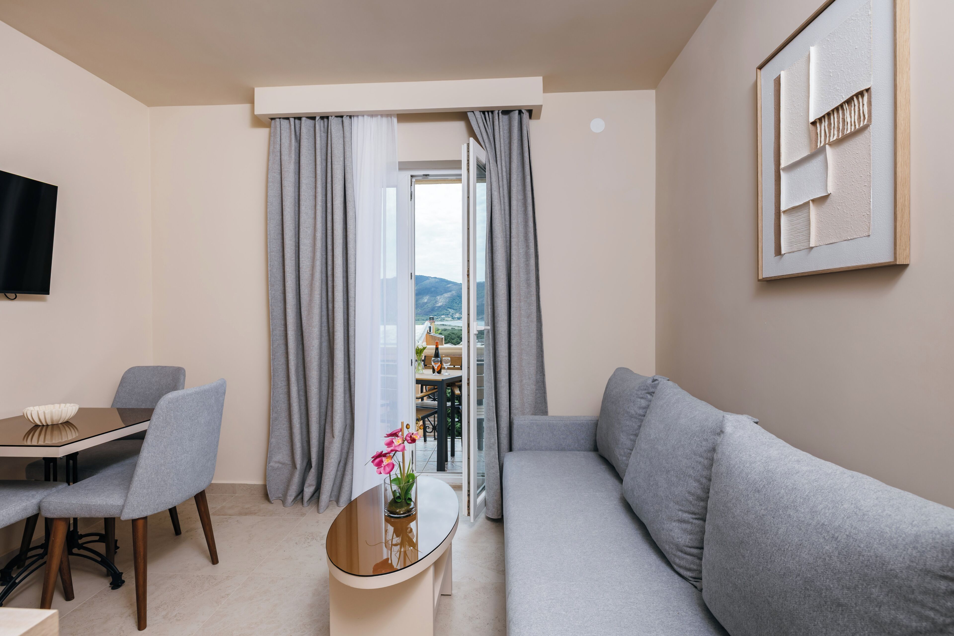 Standard Apartment, Balcony, Sea View | Living area | Flat-screen TV