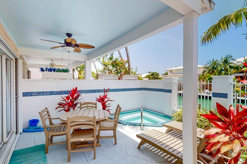 Enchanting waterfront townhouse with balcony, mini oasis pool, & washer/dryer