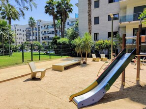 Children’s area - Family Oasis in Fenals: Large Terrace 90m², Swimming Pool and Private Parking (Lloret de Mar)
