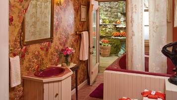 Jetted bath, hair dryer, towels, soap