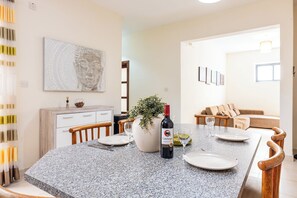 Dining - budget apartment, affordable stay, cozy apartment, family friendly, group accommodation, patio apartment, outdoor space, free wifi, smart TV, kitchen, central location, value stay, comfortable stay (Il-Mellieħa)