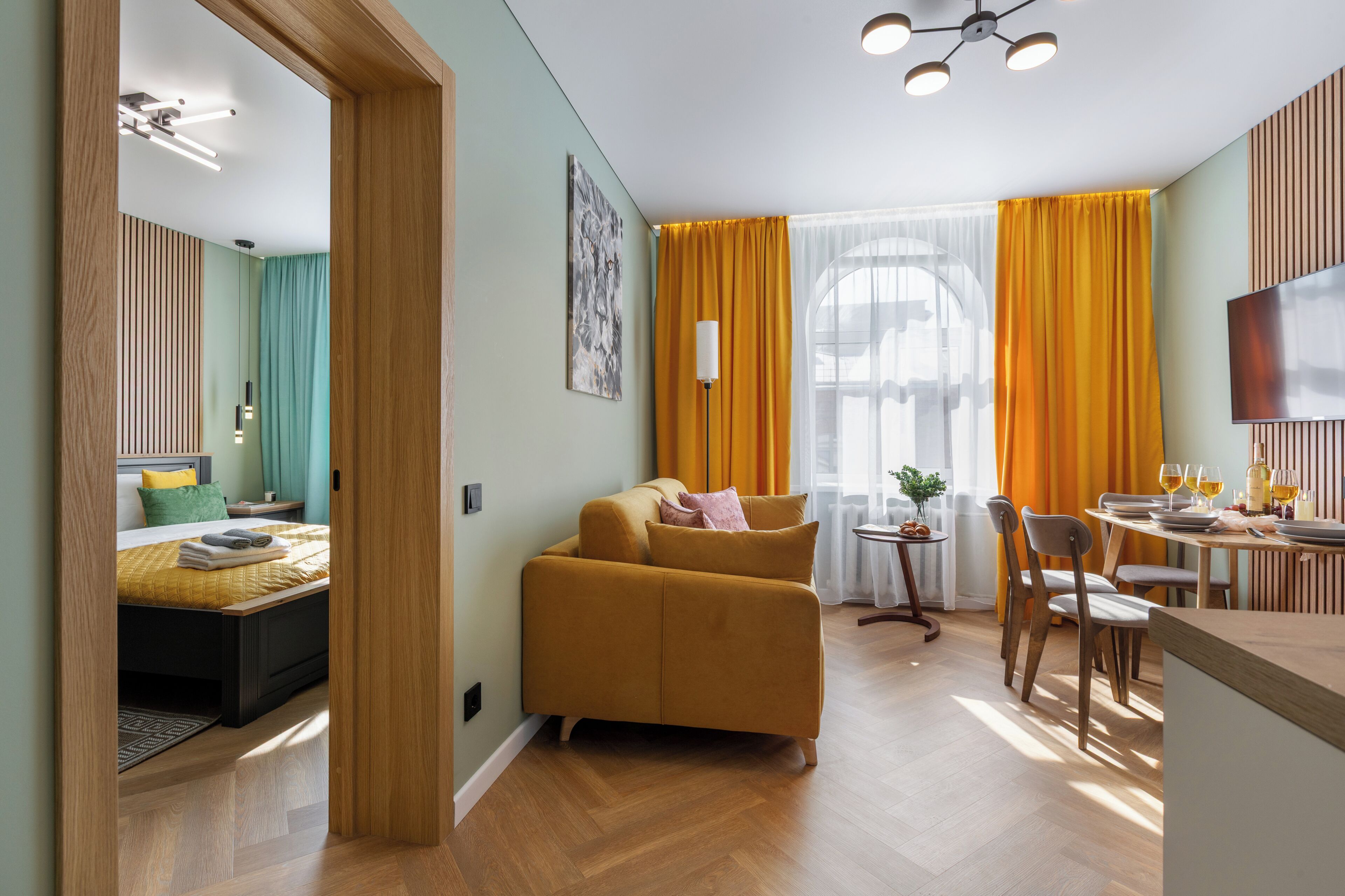 Superior Apartment, City View | Living area | 40-inch TV with cable channels