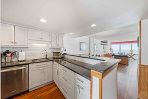 Fridge, microwave, oven, stovetop - Updated OCEANFRONT condo with pool on the Boardwalk!!! (Virginia Beach)