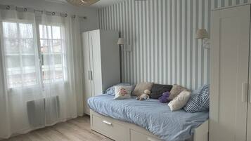 4 bedrooms, iron/ironing board, travel crib, internet