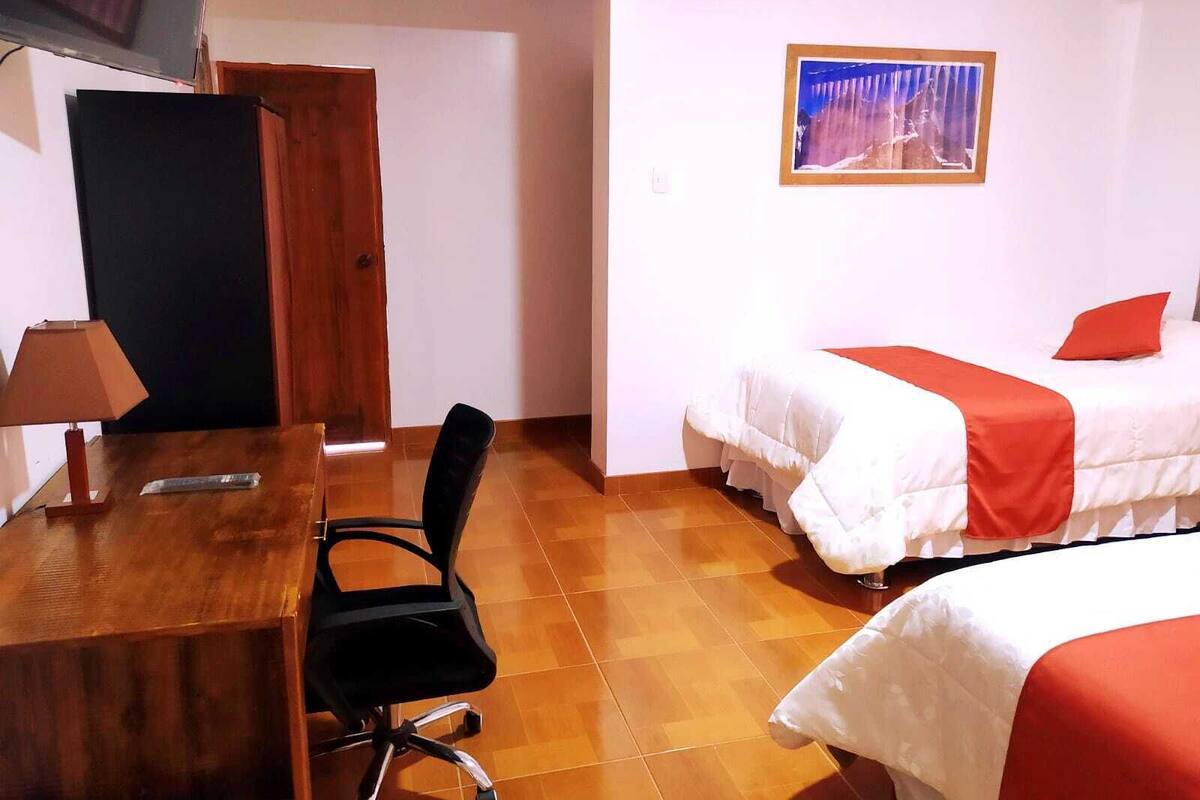 Kahden hengen deluxe-huone, parveke, näköala puutarhaan | Työpöytä, pimennysverhot, silitysrauta/-lauta, ilmainen Wi-Fi