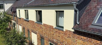 Vacation apartment with open kitchen in spacious house with courtyard and garden