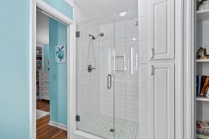 Shower, hair dryer, towels, soap