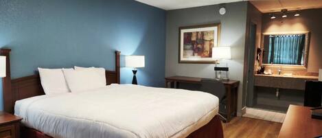 Chambre simple | Literie de qualité, bureau, espace de travail pour ordinateurs portables