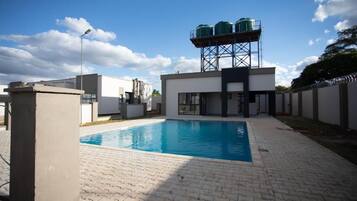 Departamento Confort, patio | Alberca | Alberca al aire libre
