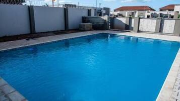 Departamento Confort, patio | Alberca