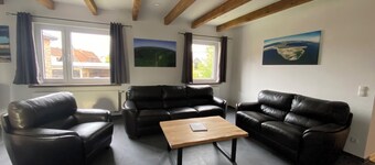 Vacation apartment on the top floor in a spacious house with courtyard and garden