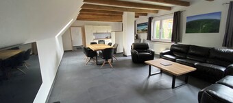 Vacation apartment on the top floor in a spacious house with courtyard and garden