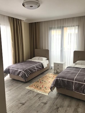 Villa empresarial | Tabla de planchar con plancha y wifi gratis 