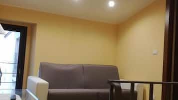 Family Studio | Living area | TV