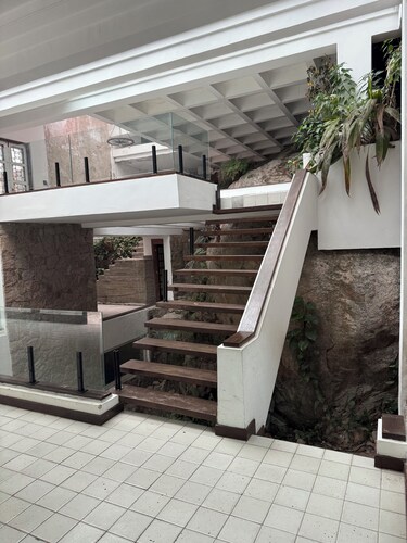 Mansion immersed in nature with a waterfall in a triplex room. (Unique in the World)