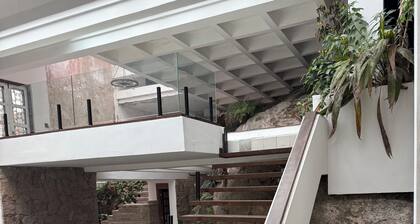 Mansion immersed in nature with a waterfall in a triplex room. (Unique in the World)