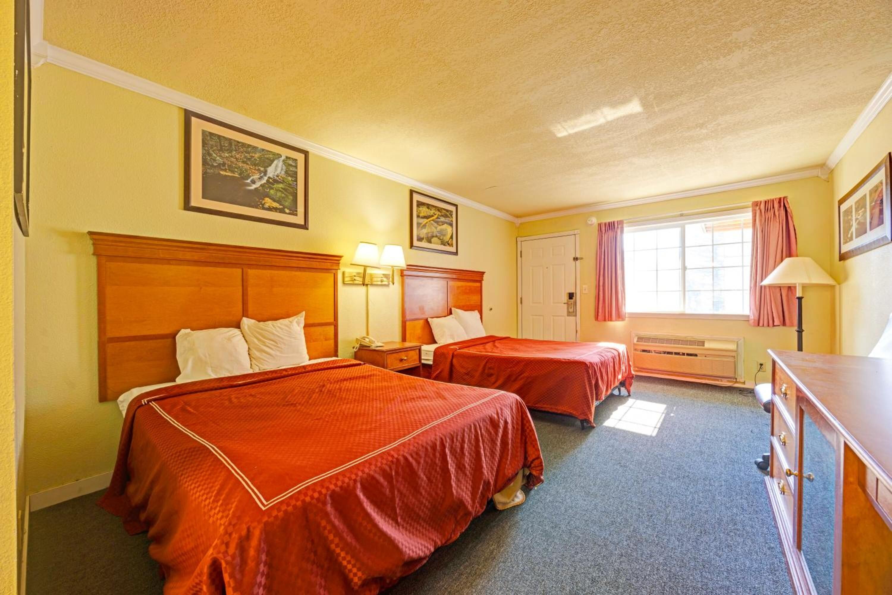 Stretch out and relax in a bright double-bed retreat.