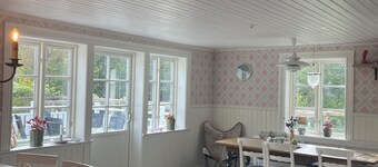 Lake house with its own swimming area, guest cottage, sauna and orangery and boules court.