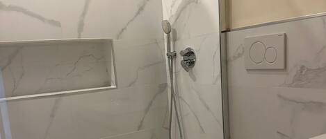 Jetted bath, towels, soap, toilet paper