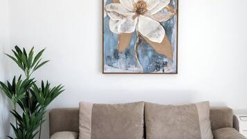 Appartamento Deluxe, vista montagna | Area soggiorno