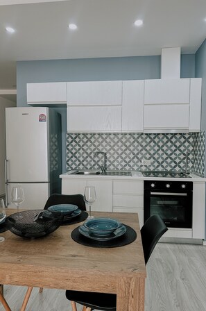 Apartamento, sacada | Cozinha privada