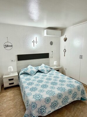 2 dormitorios, tabla de planchar con plancha, wifi gratis y ropa de cama