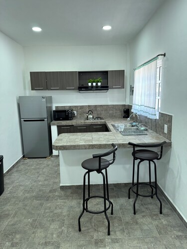 1-br bungalow in amazing San Patricio with AC, Pool, and half a block from beach