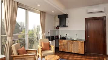 Suíte júnior, sacada, vista para a cidade | Parte interna