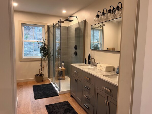 Shower, hair dryer, towels, soap