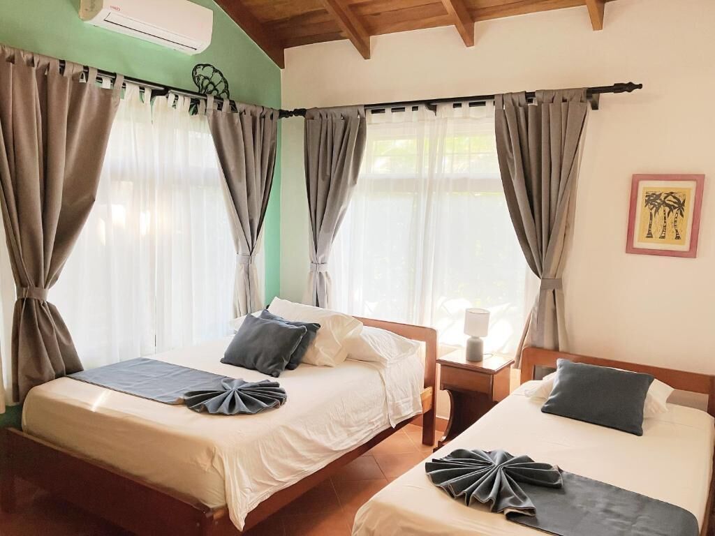 Apartment, 2 Bedrooms, Balcony, Garden View | In-room safe, blackout drapes, iron/ironing board, free WiFi