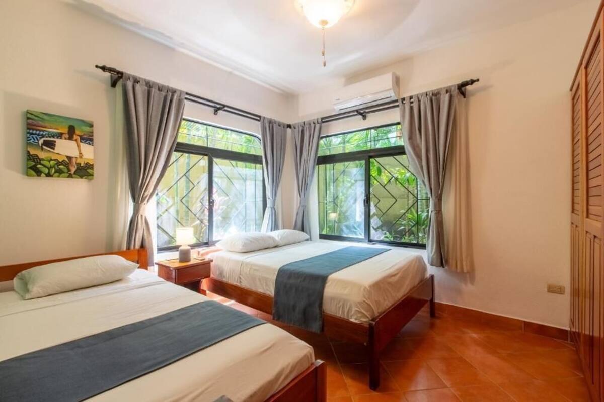 Căn hộ, 2 phòng ngủ, sân hiên, quang cảnh sân vườn | Két bảo mật tại phòng, màn/rèm cản sáng, bàn ủi/dụng cụ ủi quần áo 