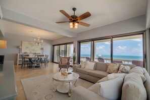 2B - Deluxe Condo, Balcony, Beach View | Living area - Oceans Edge Resort & Spa (San Pedro)