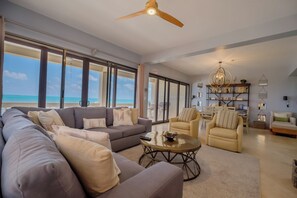 3A- Deluxe Condo, Balcony, Beach View | Living area - Oceans Edge Resort & Spa (San Pedro)