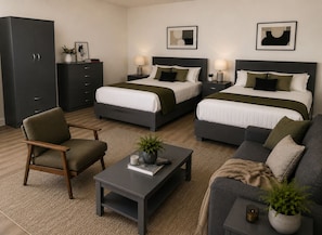 A hotel room with two beds, a sofa, a chair, a small table, and a cabinet. - Huge Luxury 3 Bedroom Duplex Apartment in Prime Location (New York)