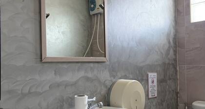Cozy 1-bedroom bed & breakfast in charming Kata with AC. Window to corridor