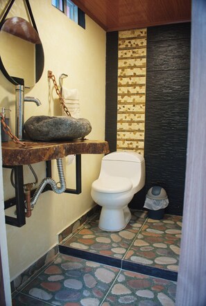 Shower, towels, soap, toilet paper