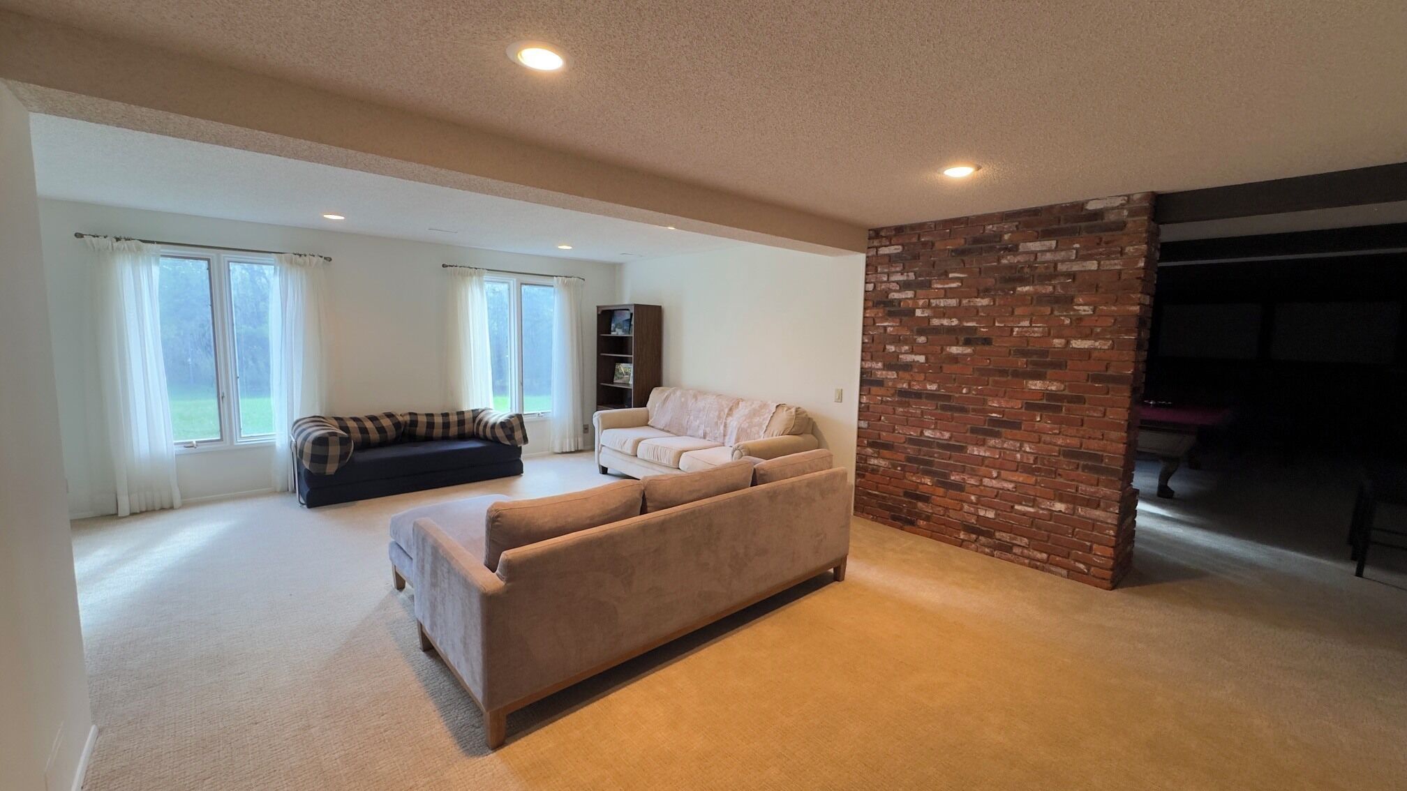 Smart TV, fireplace, foosball, books