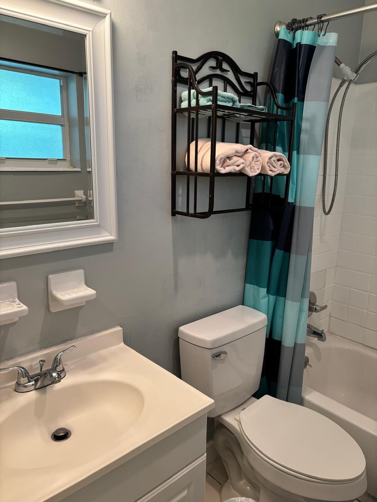 Hair dryer, towels, soap, toilet paper