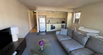 Vibrant location with trees and walking distance to city and cafes.