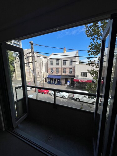 Vibrant location with trees and walking distance to city and cafes.