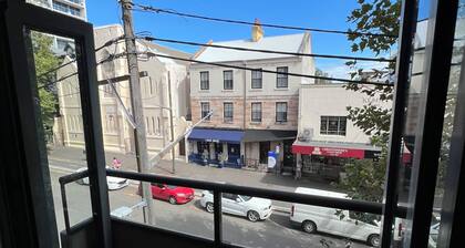 Vibrant location with trees and walking distance to city and cafes.