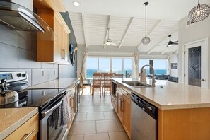 Fridge, microwave, oven, stovetop - Oceanfront Condo | Balcony, Fire Pit | Shared Beach | Sleeps 6 (Oceanside)