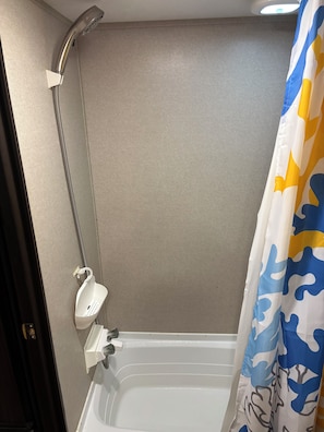 Hair dryer, towels, soap, shampoo
