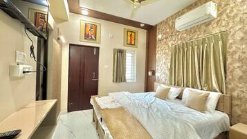 Habitación individual básica, 1 cama Queen size, para fumadores, aire acondicionado