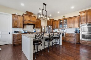 Microwave, oven, stovetop, dishwasher - Pedernales Riverfront Entertainment Retreat • Pool • 6BR • Patio Lake Travis (Spicewood)