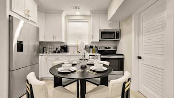 Coffee/tea maker, fridge, microwave, oven
